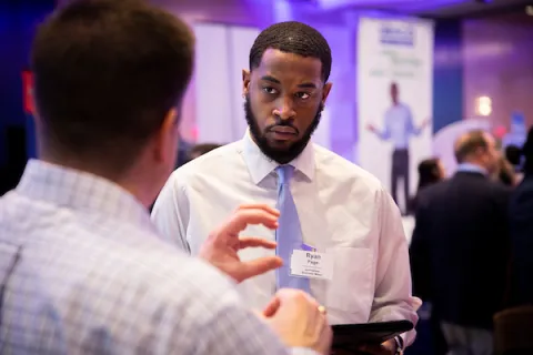 Students participate in a career fair.
