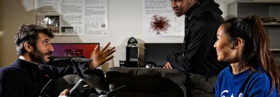 student talking with professor