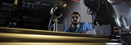 Male working with laser machines
