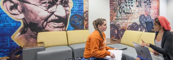 Students talking in a study room